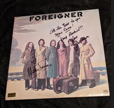 Mick Jones autographed Foreigner album with coa 115146 and with record